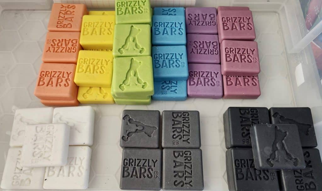 Solid shampoo soap bars in a variety of colours and fragrances